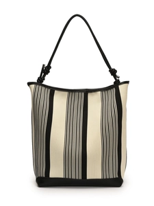 Minimalist black and white striped canvas tote bag with black leather straps for women