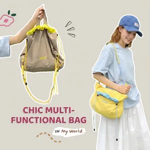 Detail of waterproof nylon drawstring bags showing khaki and blue colorblock designs