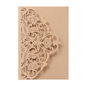 Detailed laser-cut champagne gold wedding invitation cover with intricate lace patterns