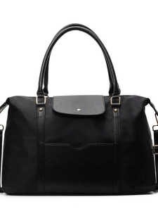 Grand sac fourre-tout noir en nylon avec anses en cuir et garnitures dorées pour le voyage