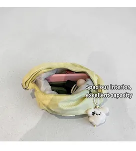 Interior view of grid pattern canvas bag showing large storage capacity and zipper