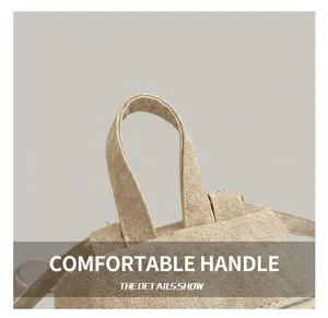 Detailed close-up of a beige woven texture backpack featuring a comfortable carrying handle