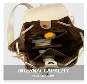 Detail view of large capacity backpack interior with brown striped lining and pockets