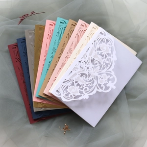 Detailed laser-cut butterfly invitation card covers in various premium colors