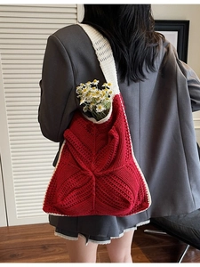 Handmade red crochet tote bag with white trim and hollow floral pattern for women