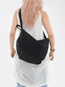 Large capacity black crossbody bag with adjustable wide strap and premium nylon texture
