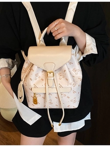 Off-white stylish synthetic leather backpack with bear print and letter patterns for women