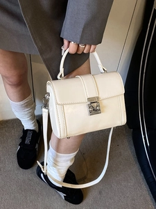 Minimalist white leather crossbody square bag with metal lock and top handle for women