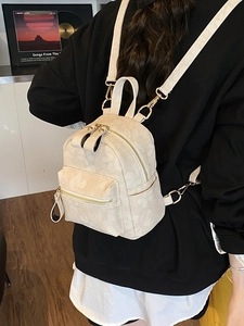 Chic cream white mini backpack with floral embossing and elegant gold hardware