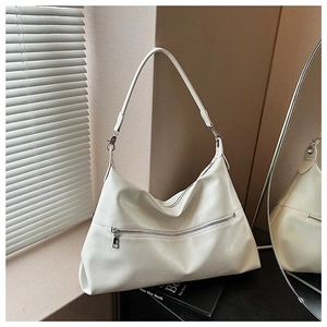 Detail of white large capacity hobo bag with zip pocket and textured PU leather