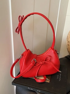 Stylish red bow shoulder bag with lychee texture and silver metal zipper detail