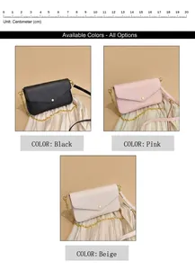 Detail view of the metal chain strap and pebble leather texture on small envelope bags