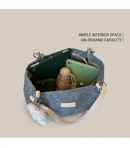 Top view of blue printed tote bag interior showing large capacity for iPad and phone