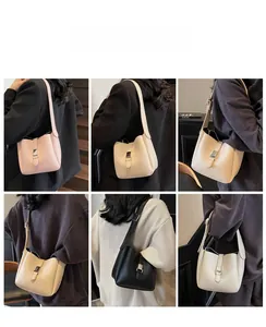 Multi-color lychee texture bucket bag collection shown on models for commuting style