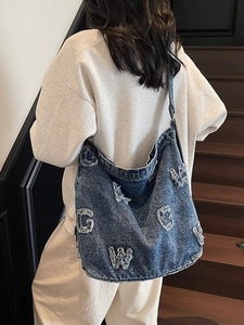 Retro denim hobo shoulder bag with frayed letter patches for women's daily commute