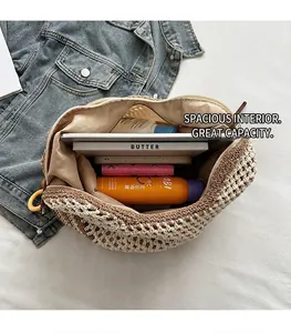 Top view of large capacity hollow knit beach bag showing tablet and cosmetics inside