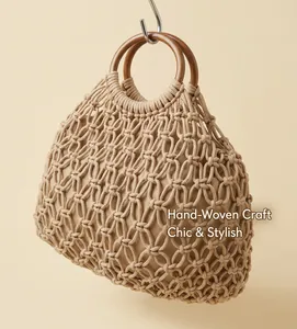 Macro detail of beige hand-woven tote bag with hollow diamond mesh pattern and inner lining