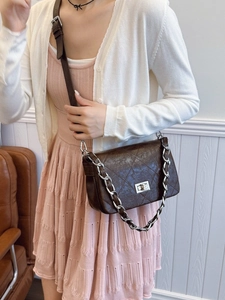 Quilted brown chain handbag for women with metallic lock and adjustable leather strap