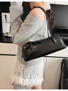 Minimalist black leather underarm bag with long straps for casual daily fashion