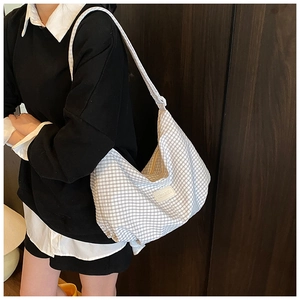 Checkered canvas hobo bag for women featuring a minimalist brand patch and large capacity
