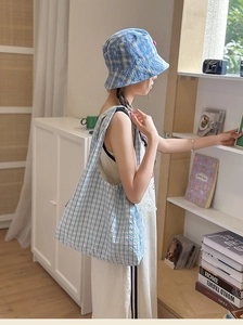 Blue and white checkered nylon crescent bag set with a matching bucket hat for women