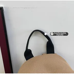 Detail of high-density nylon handle and breathable mesh back panel on black backpack