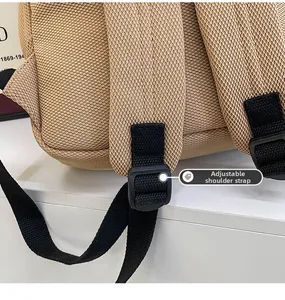 Detail of breathable khaki mesh back and adjustable black nylon shoulder straps