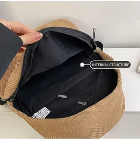 Detail showing honeycomb mesh fabric backpack with multiple internal storage pockets