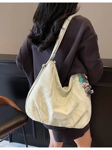 Minimalist large tote bag with cream marble texture and cute bear charm pendant