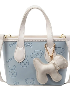 Sac seau bleu clair à la mode avec gaufrage dessin animé et pendentif chiot