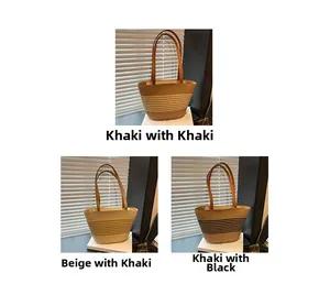 Close-up of three striped straw tote bags with leather handles in khaki and beige