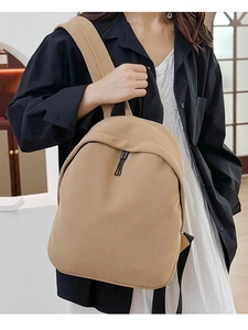 Women's light brown waffle textured oxford backpack for travel and daily leisure