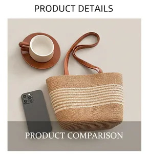 Detail of woven straw tote bag with brown leather straps and striped summer pattern