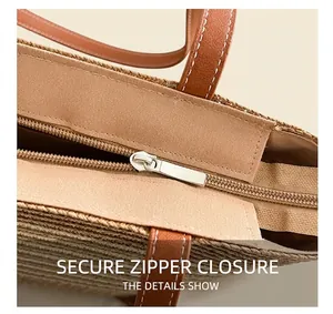 Detail of the secure zipper closure on a straw bucket bag with brown leather accents