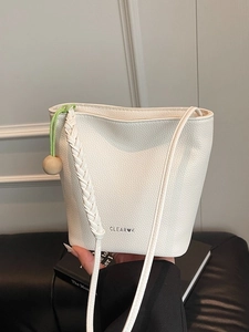 Vintage white lychee pattern leather bucket bag with woven strap and wood bead charm