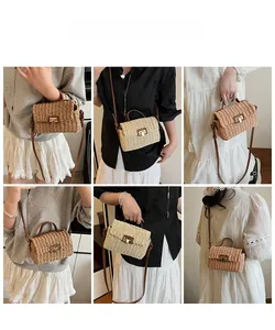 Close-up of woven straw crossbody bags with leather handles and metal clasps