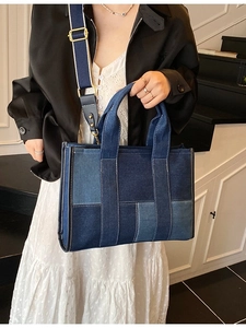 Large colorblock patchwork denim tote bag with wide shoulder strap and handles