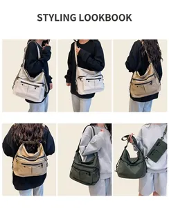 Detail view of large canvas tote bag showing multiple pockets and adjustable straps