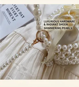 Detail of pearl woven bucket bag showing satin drawstring closure and gold hardware