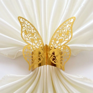 Elegant gold hollow butterfly napkin ring with intricate floral laser cut patterns