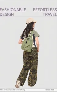 Détail du sac à bandoulière multifonction en nylon vert olive avec cordons réglables