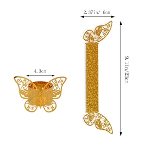 Macro detail of butterfly napkin rings showing dimensions and gold glitter laser-cut texture