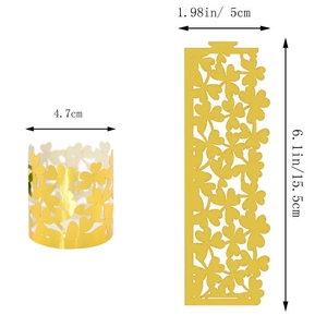 Detail view showing laser-cut clover pattern and dimensions of the golden napkin ring