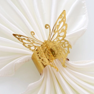 Elegant gold butterfly hollow napkin rings with glitter finish for wedding party tables