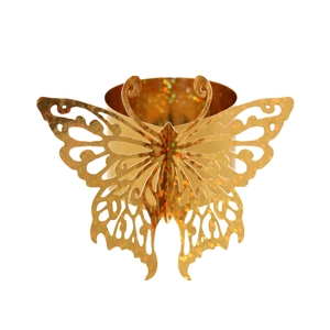 Macro shot of gold butterfly paper napkin ring featuring intricate laser-cut hollow details