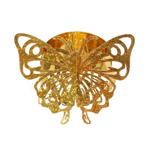 Close-up of golden butterfly napkin ring with laser-cut hollow design and glitter finish