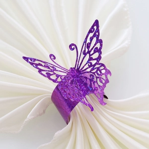Elegant purple glitter butterfly napkin ring with laser-cut hollow details for party decor