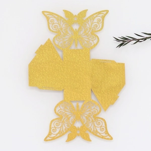 Detailed laser-cut butterfly gift box flat layout in sparkling gold glitter finish