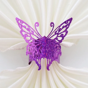 Sparkly purple butterfly napkin ring with laser-cut hollow pattern for wedding decor