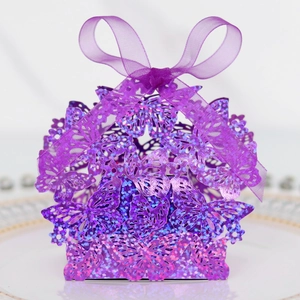 Detail of purple laser-cut butterfly gift box with glitter finish and silk ribbon bow